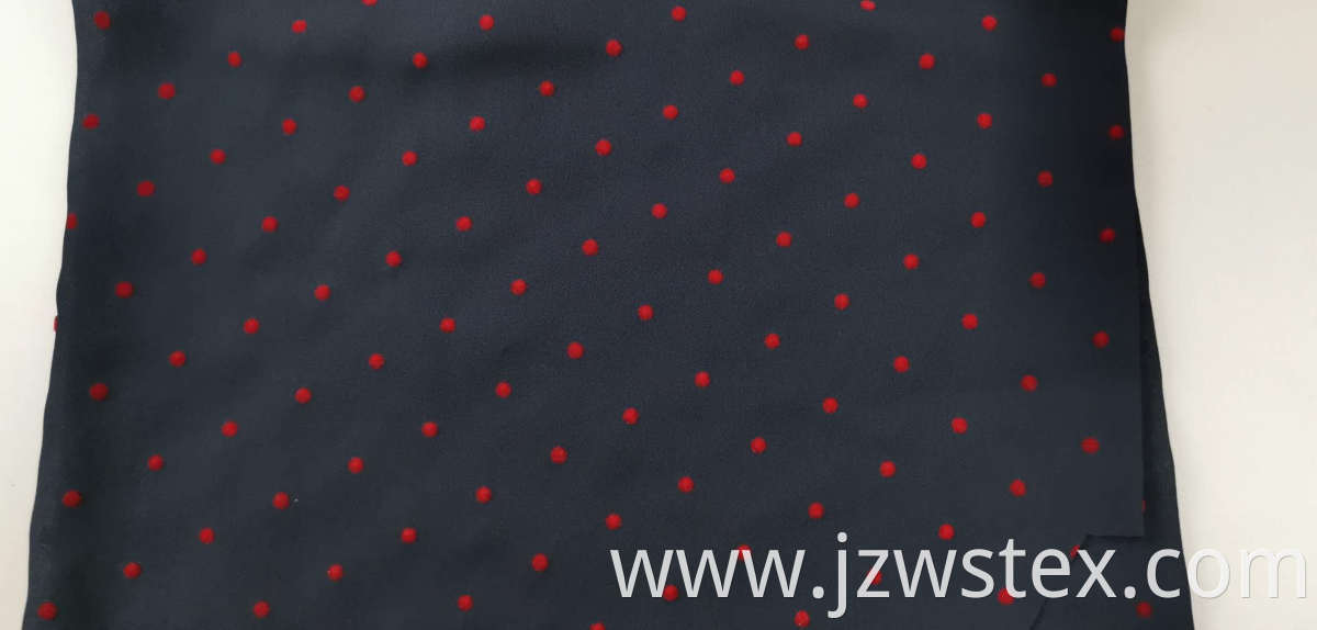 100% Polyester moss crepe with Red flocking dots Inelasticfabric